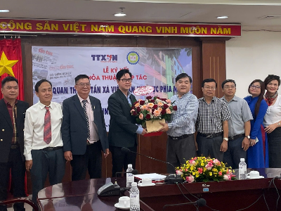 Cơ quan TTXVN khu vực phía Nam ký kết hợp tác với Trường Đại học Kinh tế Công nghiệp Long An